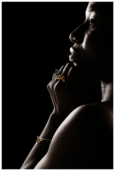 Dark skinned model with jewelry